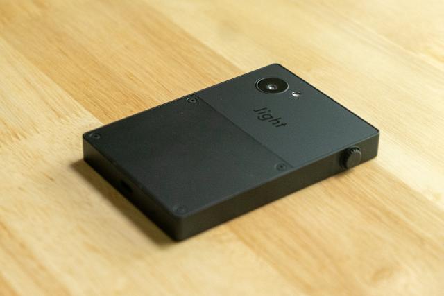 There's a screen brightness dial on one side. 