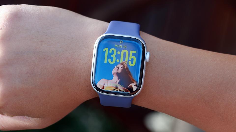 The Apple Watch Series 11 on a person's wrist, showing the home screen.