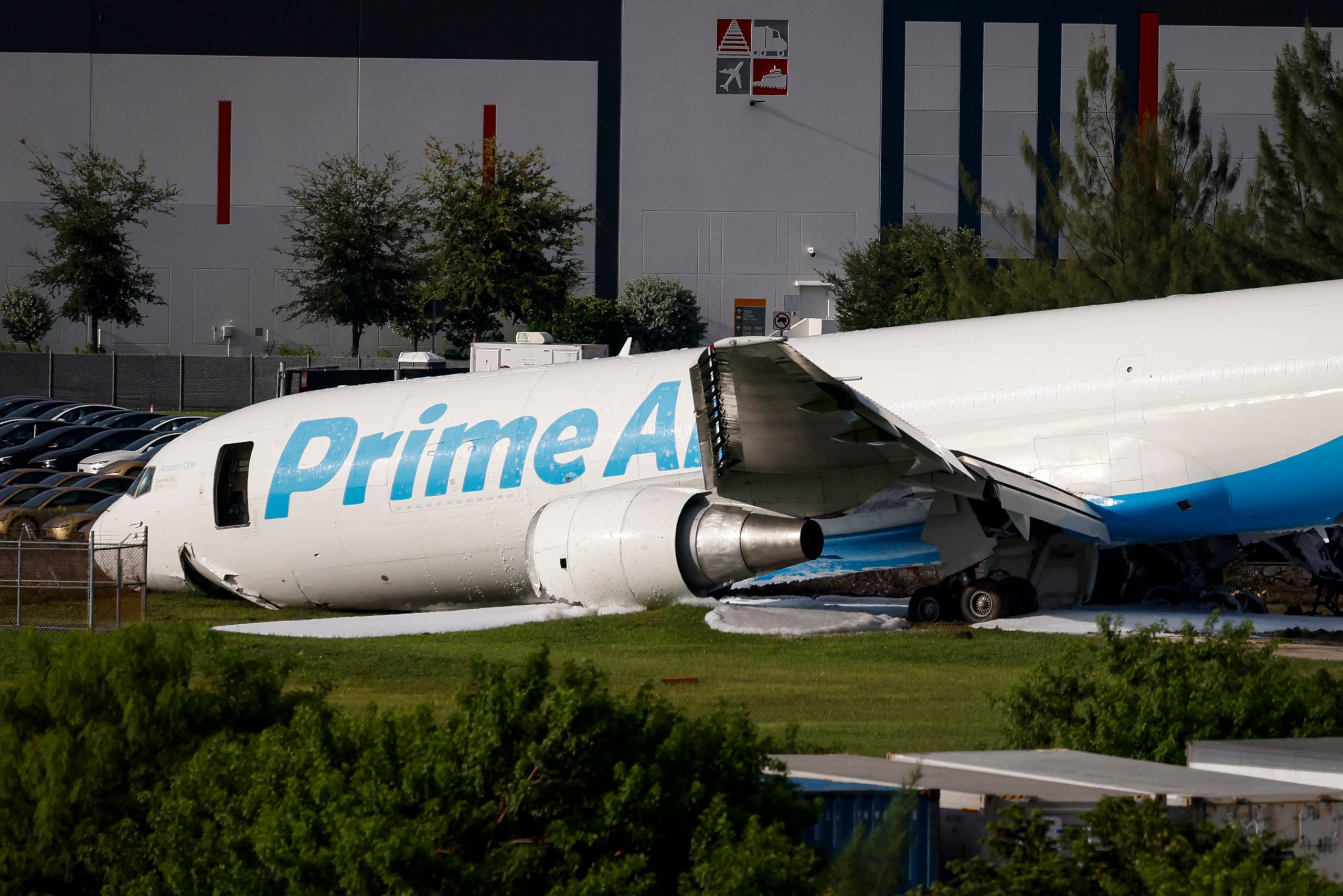 Crashed Amazon cargo jet struck two vehicles, ended up 1,300 feet past runway, NTSB says